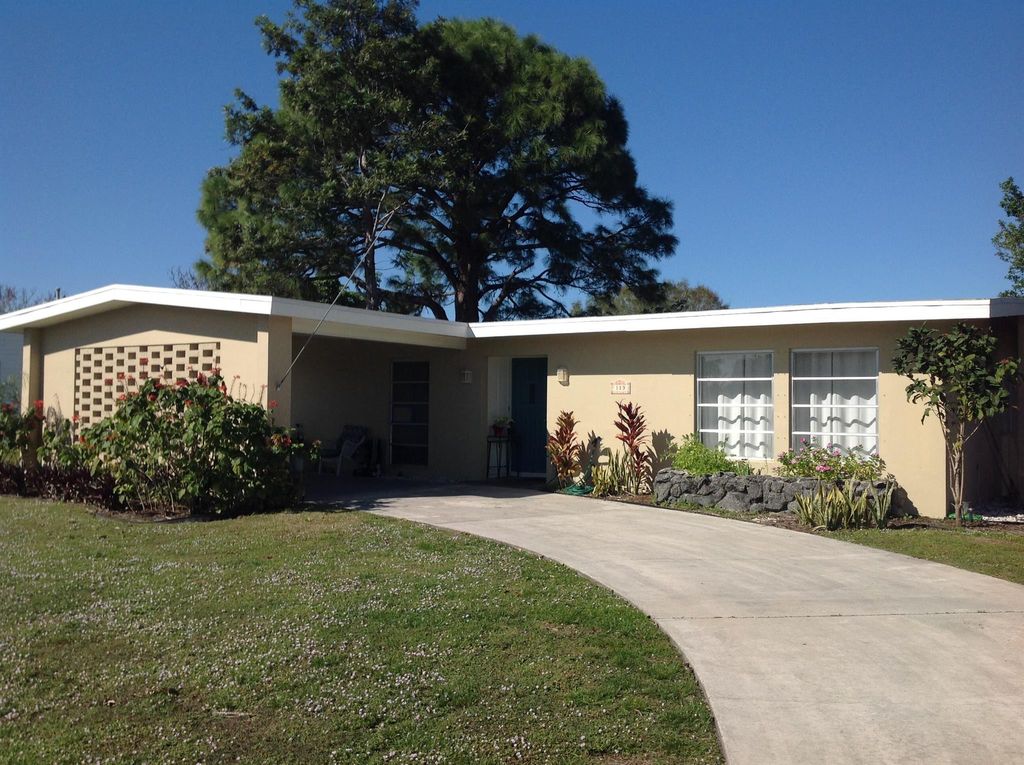 Photo of 113 NE Tunison Avenue, Port St Lucie, FL 34983 (MLS # R11093121)
