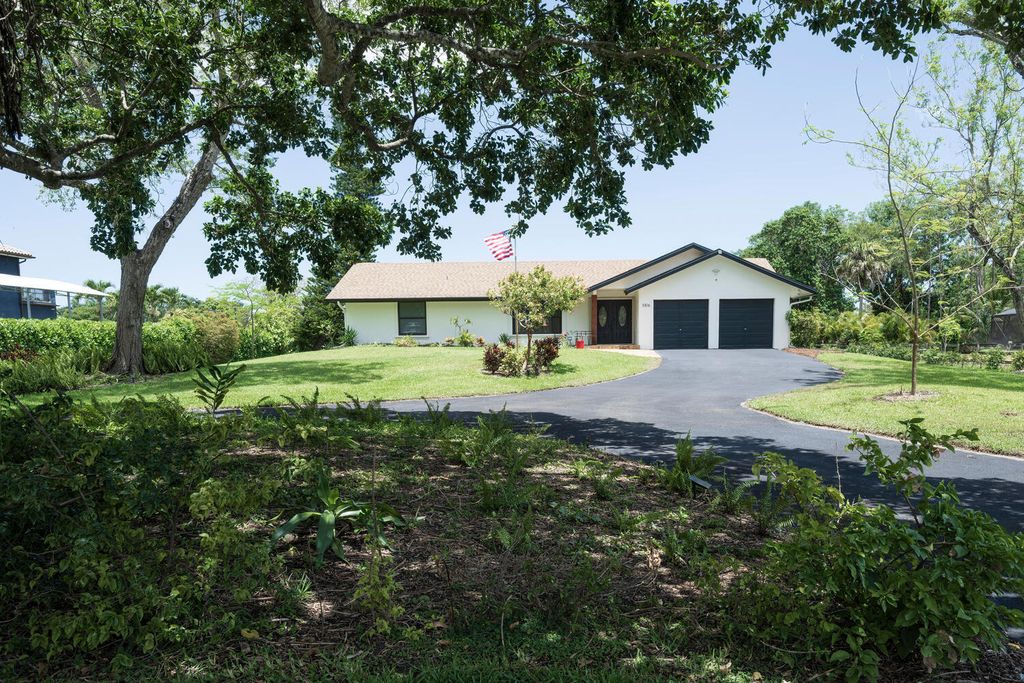 Photo of 5816 NW 77th Terrace, Parkland, FL 33067 (MLS # R10988787)