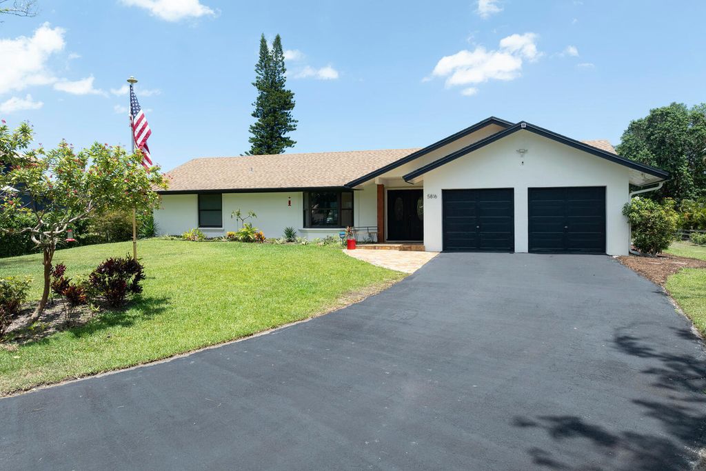 Photo of 5816 NW 77th Terrace, Parkland, FL 33067 (MLS # R10988787)