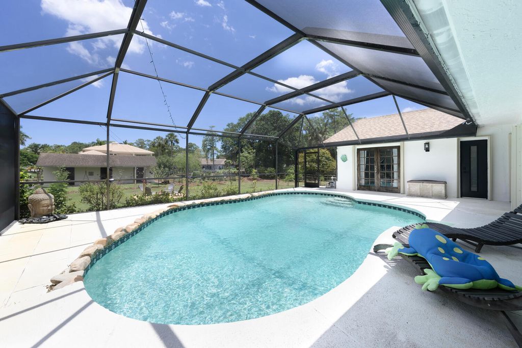 Photo of 5816 NW 77th Terrace, Parkland, FL 33067 (MLS # R10988787)