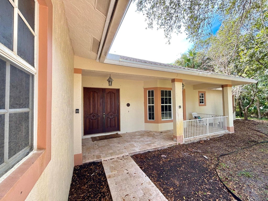 Photo of 9218 Whippoorwill Trail, Jupiter, FL 33478 (MLS # R11050739)