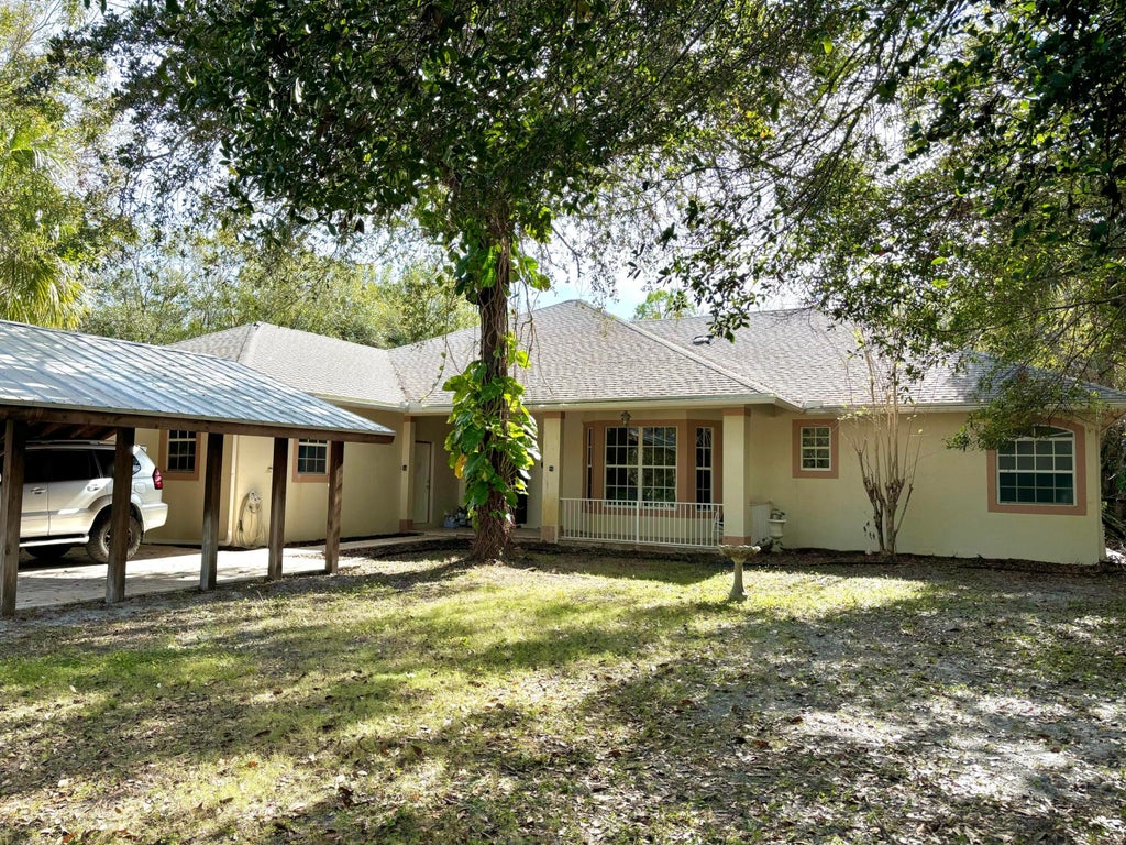 Photo of 9218 Whippoorwill Trail, Jupiter, FL 33478 (MLS # R11050739)
