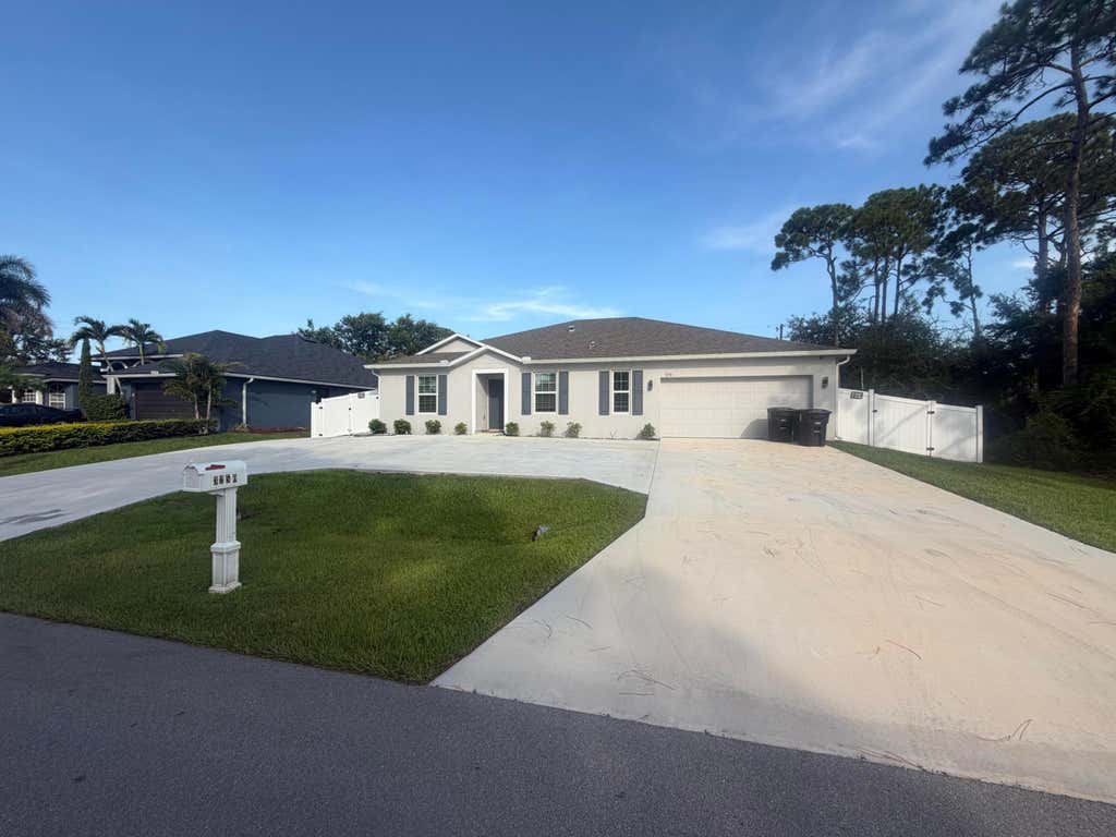 Photo of 3250 SW COHUTTA Street, Port Saint Lucie, FL 34953 (MLS # B26064517)