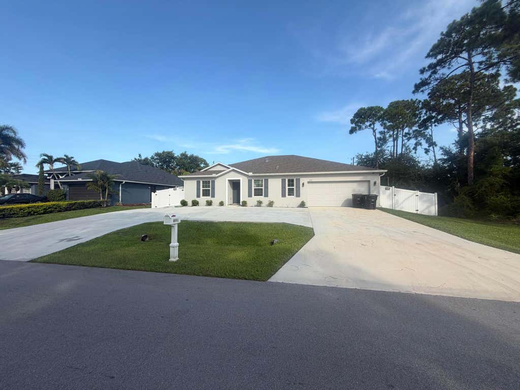 Photo of 3250 SW COHUTTA Street, Port Saint Lucie, FL 34953 (MLS # B26064517)
