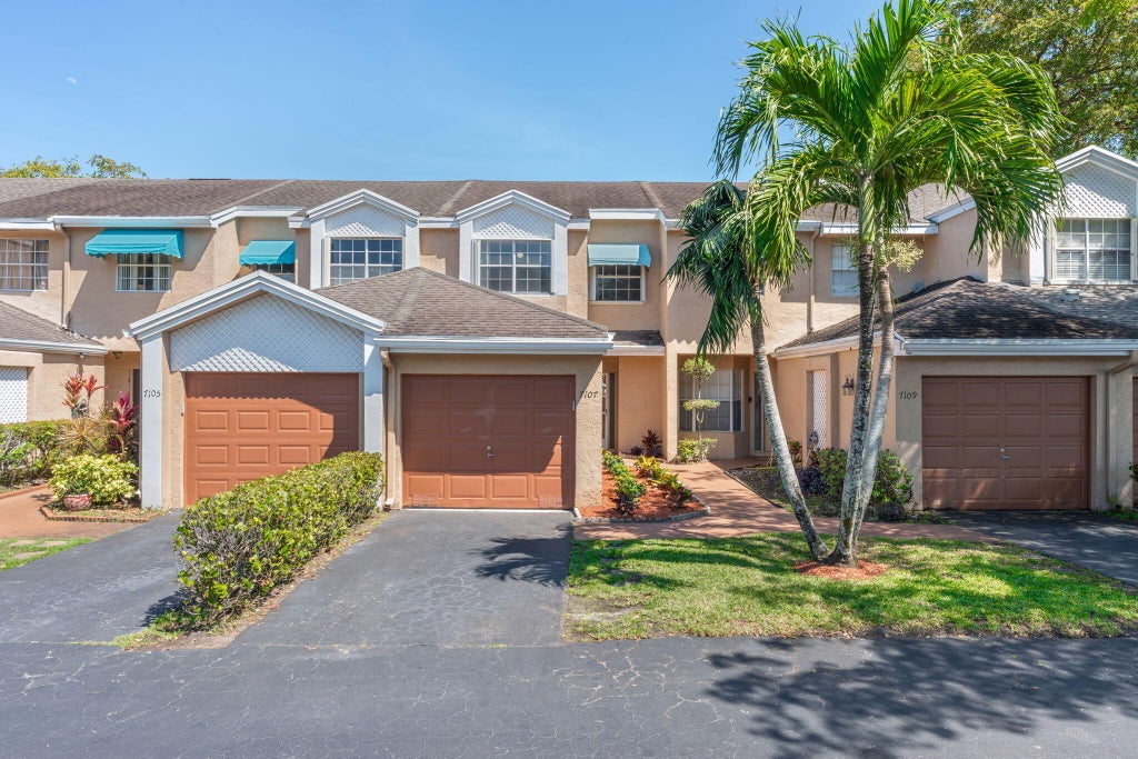 Photo of 7107 Woodmont Way, Tamarac, FL 33321 (MLS # B26072194)
