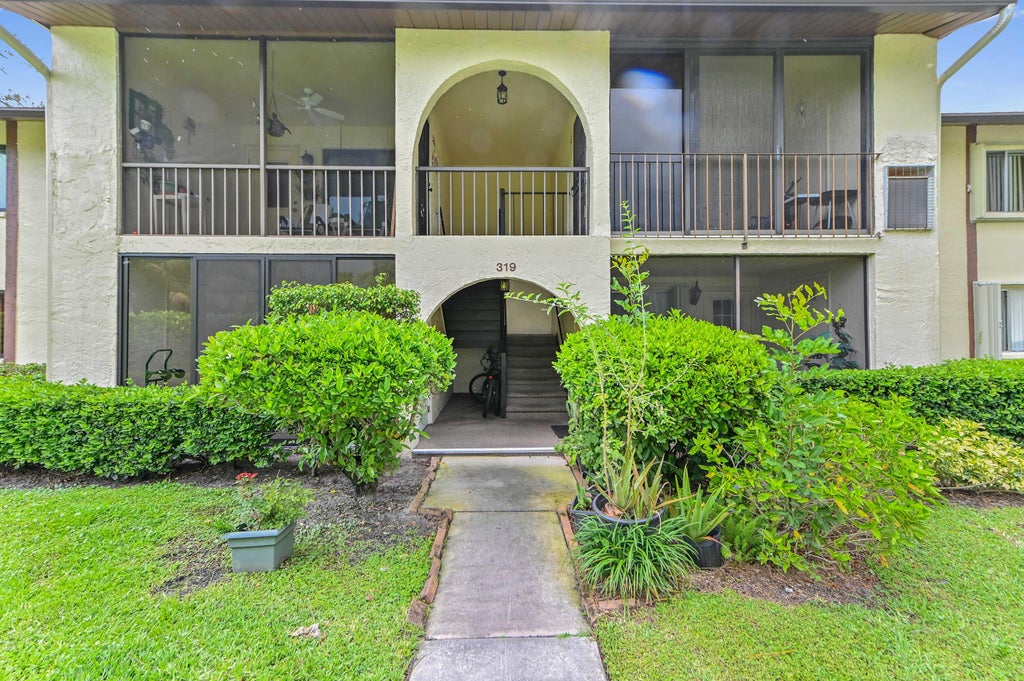 Photo of 319 Knotty Pine Circle #C-1, Greenacres, FL 33463 (MLS # B26037385)