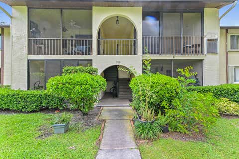 Tiny photo for 319 Knotty Pine Circle #C-1, Greenacres, FL 33463 (MLS # B26037385)