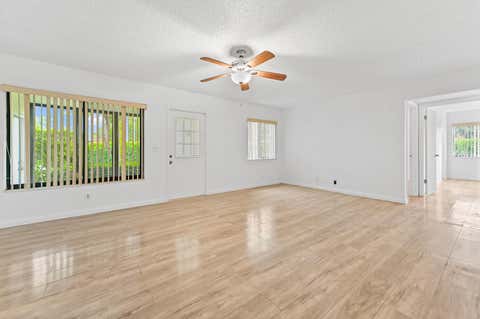 Tiny photo for 319 Knotty Pine Circle #C-1, Greenacres, FL 33463 (MLS # B26037385)