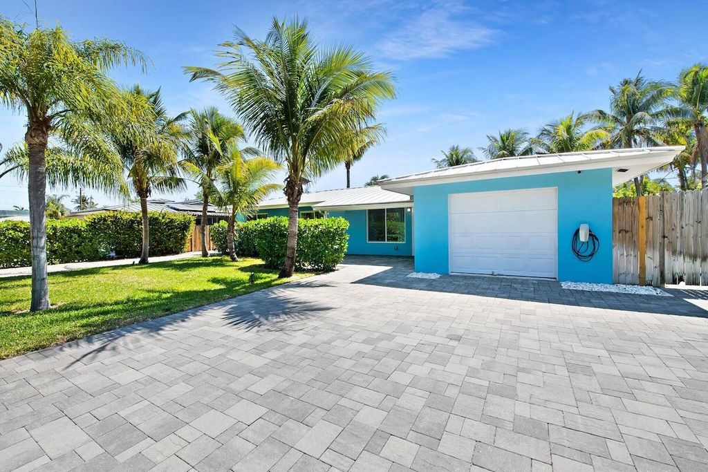 Photo of 486 NE 29th Street, Boca Raton, FL 33431 (MLS # B26022037)