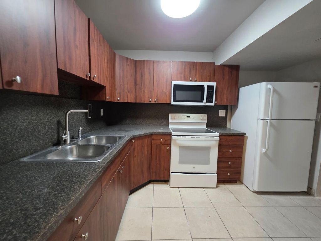 Photo of 2767 NW 58th Terrace, Lauderhill, FL 33313 (MLS # B26002135)