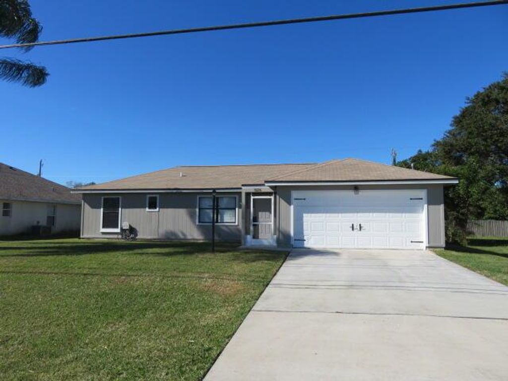Photo of 3226 SW Savona Boulevard, Port Saint Lucie, FL 34953 (MLS # R10943560)