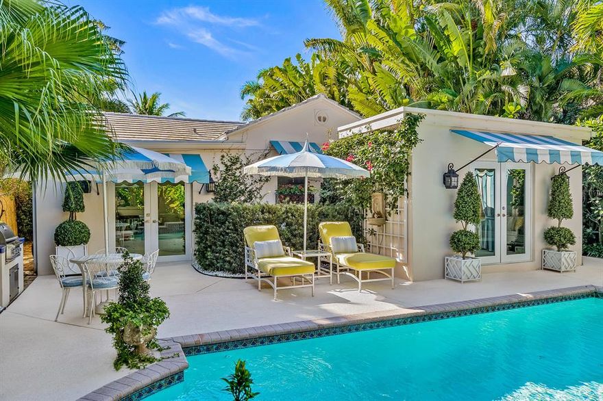 Magical and located on the lake block, design excellence can be seen throughout the house and guest house.  Outdoor spaces surrounding the pool include mature landscaping, dramatic lighting, and cozy dining areas.   The 1-bedroom guest house with kitchen and bath is ideal for guests.  You can breeze right into this house and start living your Palm Beach lifestyle.  Meticulous details and a full renovation have been completed for you.  Renovations include: kitchen and baths, hurricane impact doors and windows, custom interior doors, built-in cabinetry, A/C, Lutron lighting, irrigation system, pool filter, water heater, custom shades and California Closets throughout.  Just a block from the Intracoastal, it is a place to call home or a lily pad for the winter.  This house will make you smile