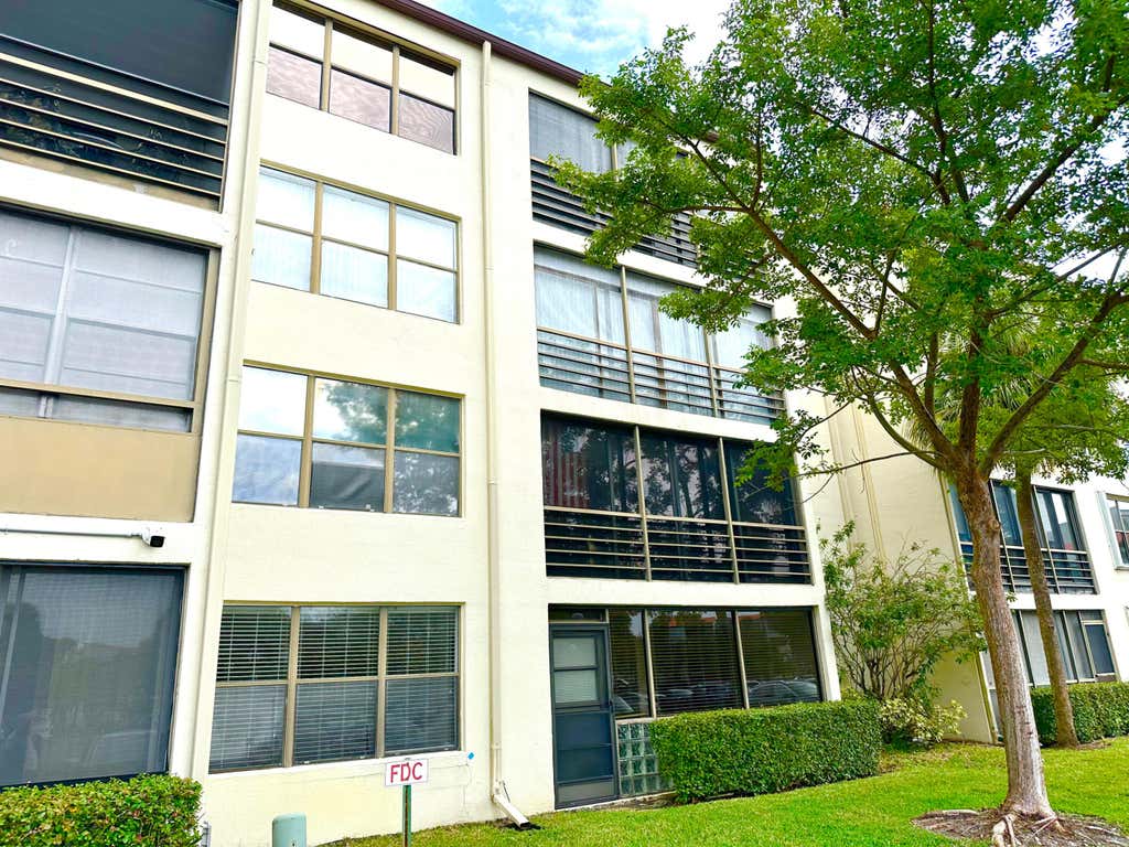 Photo of 2306 S Cypress Bend Drive #117, Pompano Beach, FL 33069 (MLS # R10951777)