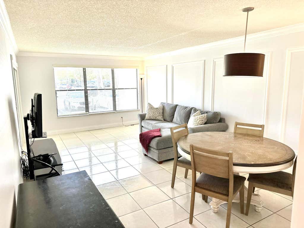 Photo of 2306 S Cypress Bend Drive #117, Pompano Beach, FL 33069 (MLS # R10951777)