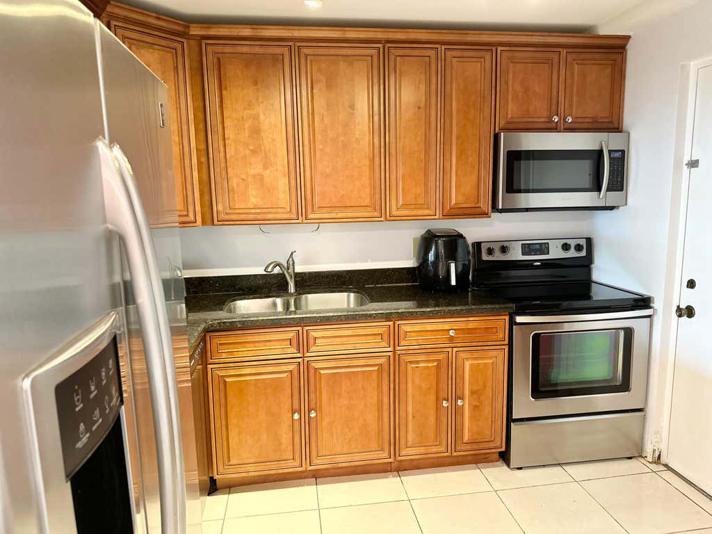 Photo of 2306 S Cypress Bend Drive #117, Pompano Beach, FL 33069 (MLS # R10951777)