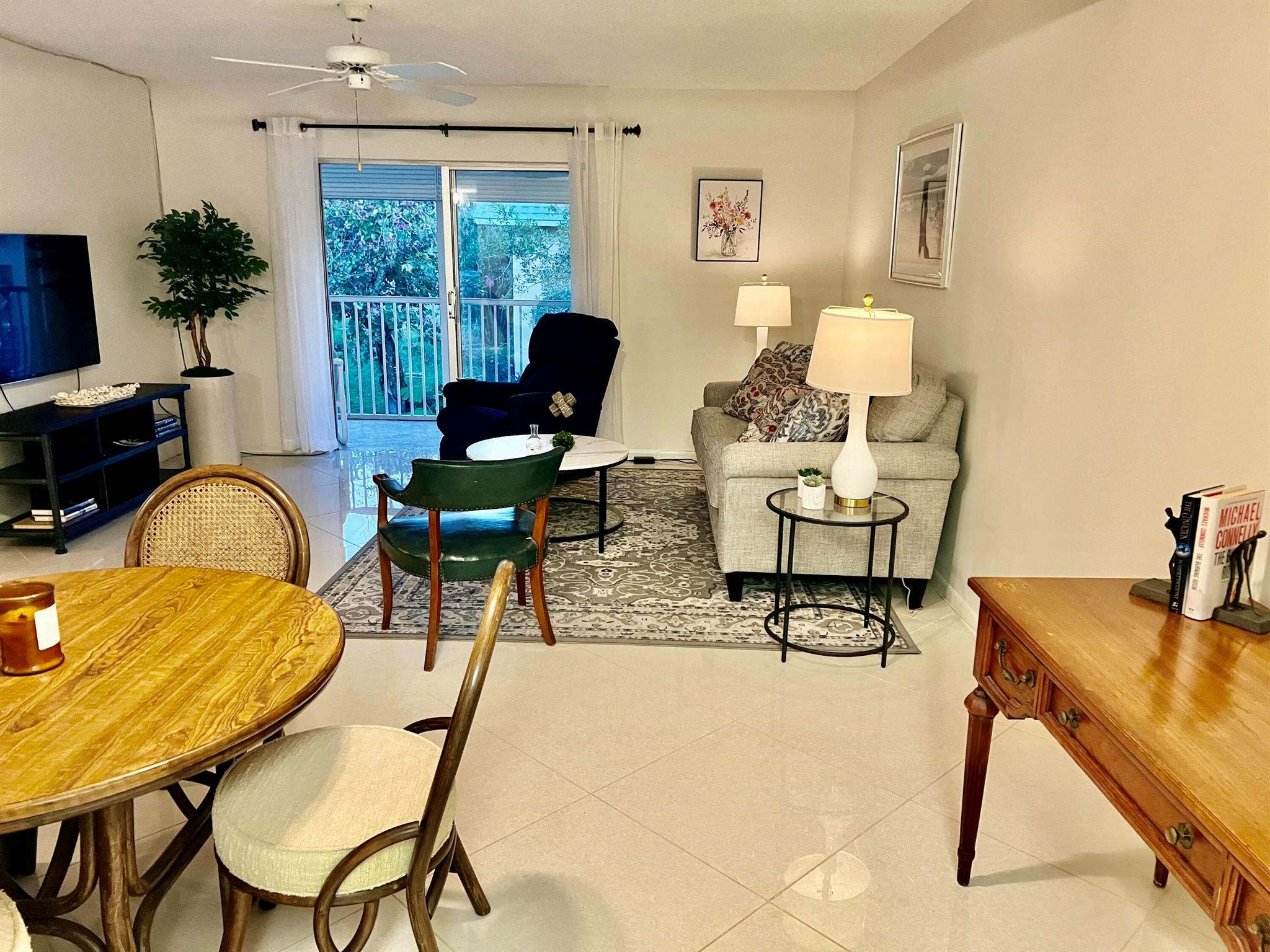 Welcome to Little Club, a serene and vibrant 55+ community nestled in Jupiter, FL, adjacent to the lush beauty of Jonathan Dickinson State Park. This beautifully furnished 2-bedroom, 1-bathroom second-floor condo offers the perfect blend of tranquility and activity. The unit features stunning tile flooring throughout, a modern kitchen, and a lovely screened-in patio where you can enjoy views of nature.Little Club residents enjoy a host of amenities, including a heated pool, pickleball, tennis, bocce ball, a 9-hole golf course, and a clubhouse with social events and a well-stocked library. The rental fee covers Bluestream fiber optic TV and WiFi, water, building insurance, and all lawn and amenities upkeep.