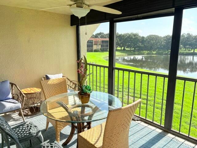 Photo of 5380 WOODLAND LAKES Drive #216, Palm Beach Gardens, FL 33418 (MLS # B26087185)