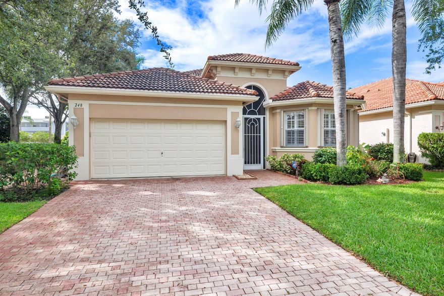 Fantastic opportunity in the City of Atlantis. Rarely available home in The Palms offering 2 bedrooms plus separate office/den, 2 bathrooms, large screened patio, 2 car garage, high ceilings, and much more. Additional features include an open kitchen, spacious master bath with dual sinks, utility room, 2 car driveway, CBS construction, and an abundance of natural light. Very quiet and private location within The Palms community.  City of Atlantis is a private gated community offering two outstanding golf clubs, tennis courts, Kintz Park, and it's own City Council and Police Department. Located adjacent to JFK Hospital, and minutes away from downtown West Palm Beach, Lake Worth, the beach and PBI Airport.