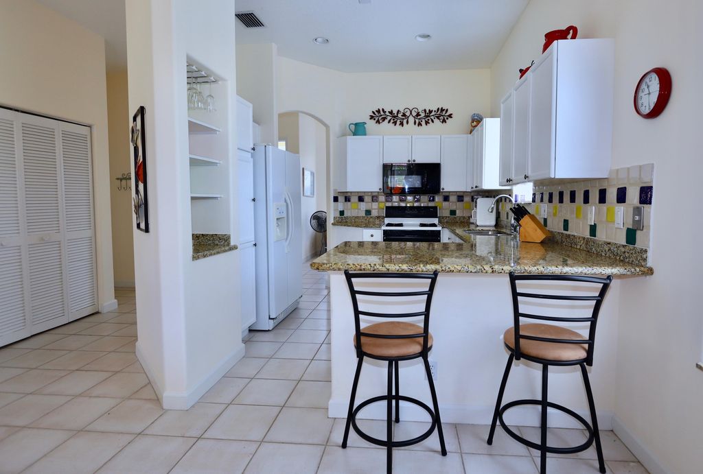 Photo of 77 Spyglass Way N, Palm Beach Gardens, FL 33418 (MLS # R10664475)