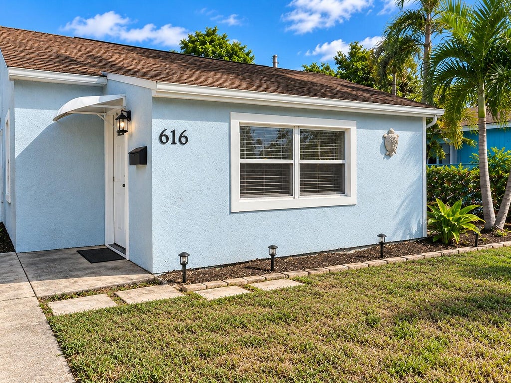 Photo of 616 W 1ST Street, Riviera Beach, FL 33404 (MLS # B26094917)