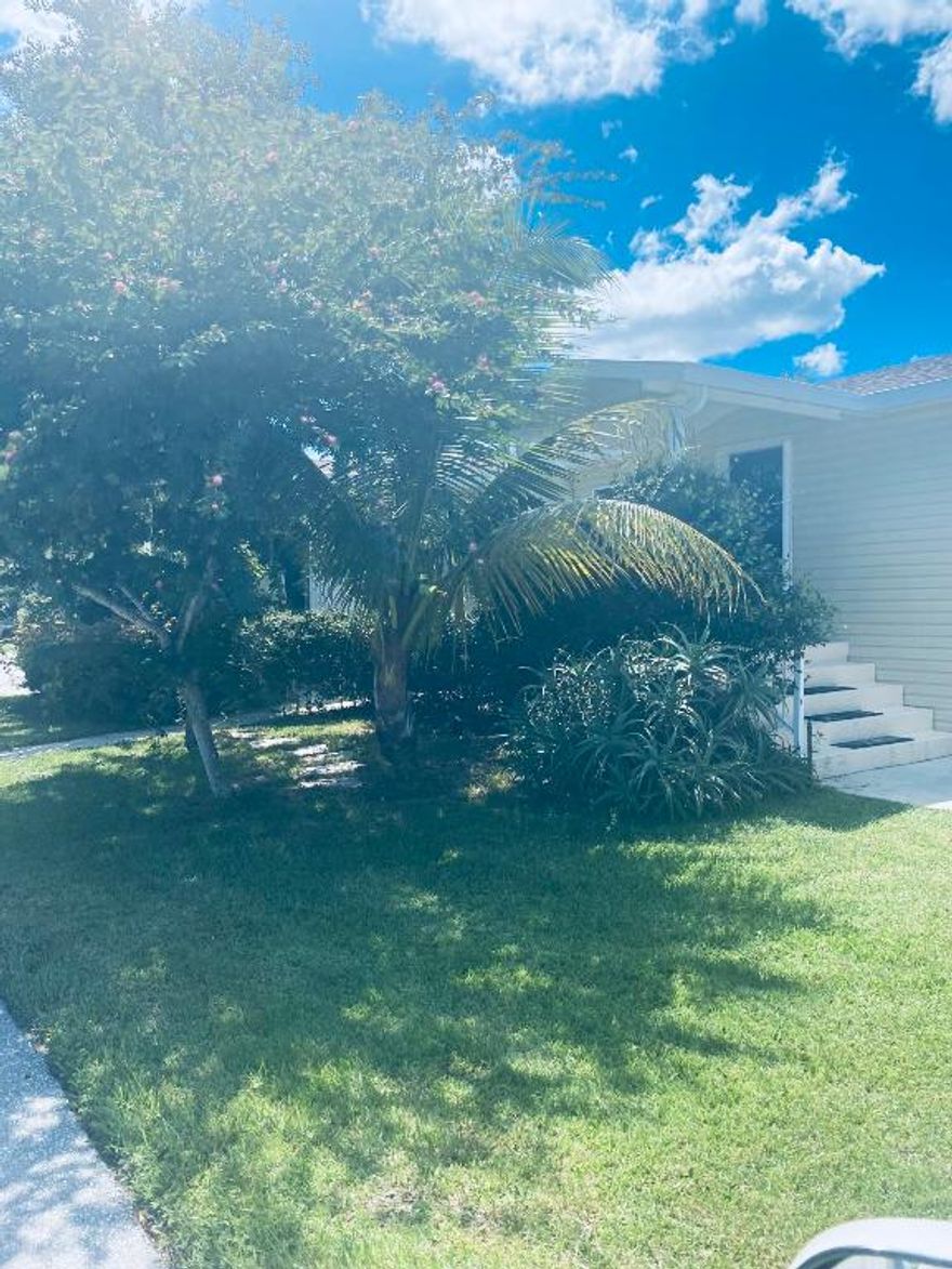 Don't miss this beautiful 2 bedroom 2 full baths plus Bonus Room has been upgraded inside and outside, this is a must see home ! New Stainless Appliances 2020, New Washer & Dryer 2020, Newly Painted Interior and Exterior, Plantation Shutters , Tinted Windows, Florida Room has New Windows and AC for extra living space ,Granite Counters in Kitchen, tile floors in kitchen, Laminate wood floors in all throughout  , Master Bath features Double Sinks, Shower with tile and tumbled stone floor, Master bedroom is spacious enough for a king size bed and offers a large walk in closet. There is a formal dining area and also an eat in kitchen area. This home is on a corner lot with front porch and also a private patio. Very tranquil location with beautiful vegetation. Exterior shed for extra storage.