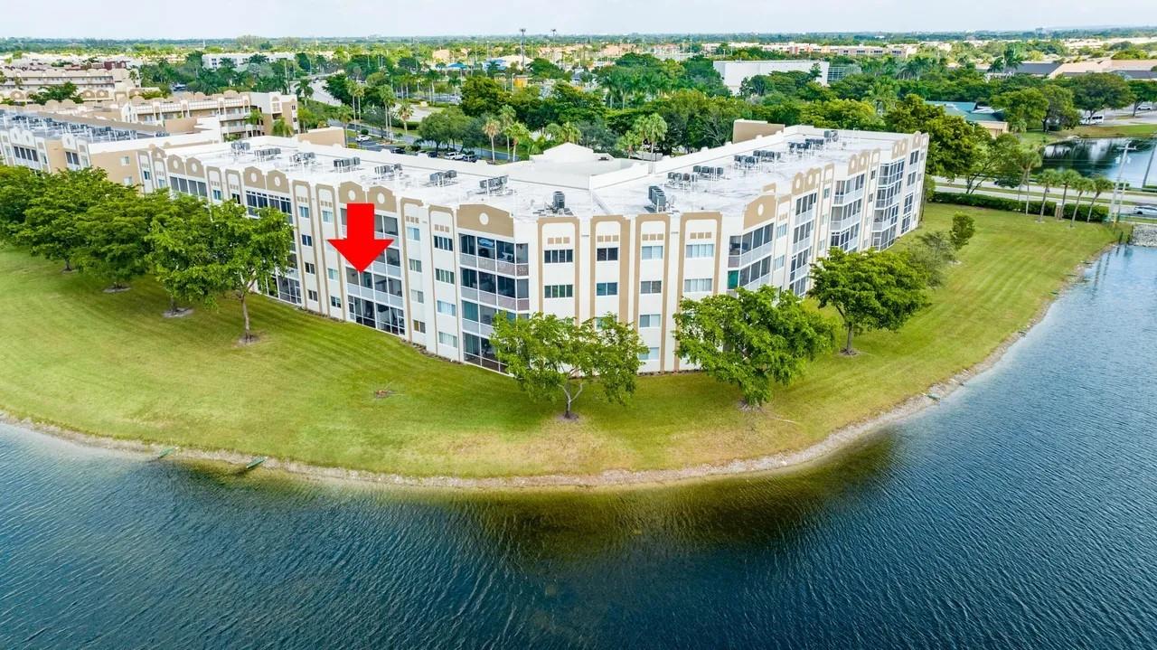 Welcome home to this light and bright 2 bedroom, 2 bathroom condo located in the Southampton subdivision of Kings Point. This charming unit boasts split bedrooms, impact windows and doors, and a lovely waterfront view. The spacious guest bedroom is equipped with a murphy bed. Plenty of closet space and storage. Full Washer & Dryer included in the unit. Furniture Negotiable. Kings Point is an active 55+ community with many resort style amenities which include a gym with fitness classes, tennis, pickleball, card room, billiards, theatre, art classes, 2 clubhouses, 5 pools, a 24 hour manned gate, free shuttle and more! CLUBHOUSE DEED PAID IN FULL!!! Only ESA or service animals permitted. The Association dues include: cable, internet, pest control, water, and security.. BRING ALL OFFERS