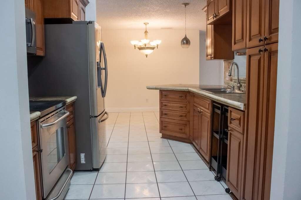 Photo of 1761 SW Monterrey Lane, Port Saint Lucie, FL 34953 (MLS # B26011310)