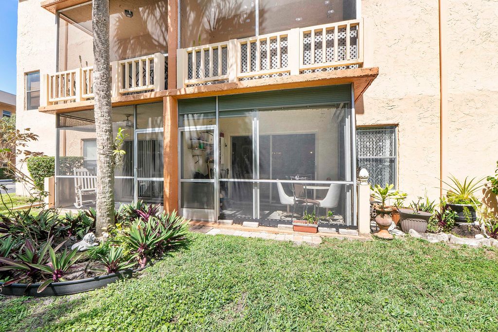 Photo of 8390 Lagos De Campo Boulevard, Tamarac, FL 33321 (MLS # B26001513)