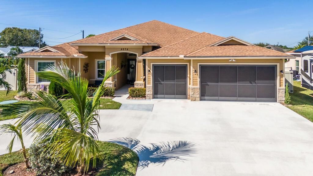 Photo of 4674 SW Monaco Street, Port Saint Lucie, FL 34953 (MLS # R10933527)