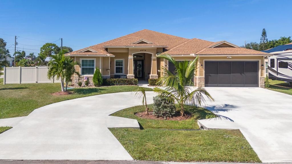 Photo of 4674 SW Monaco Street, Port Saint Lucie, FL 34953 (MLS # R10933527)