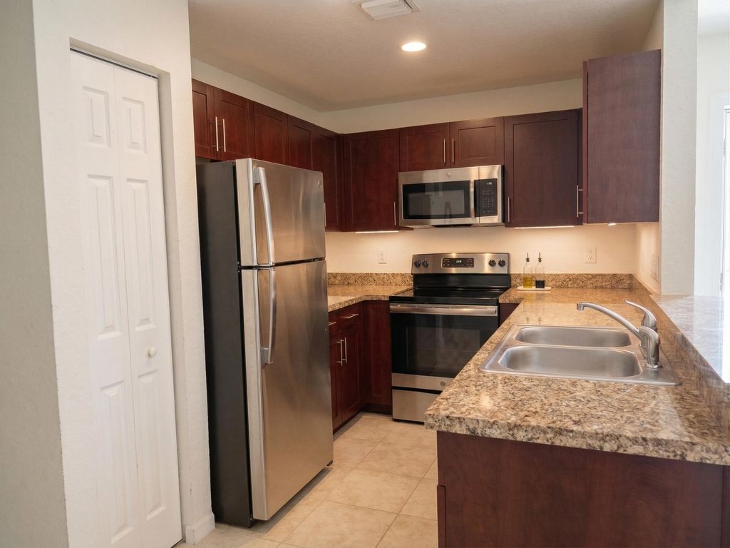 Photo of 4332 NW 1st Terrace, Deerfield Beach, FL 33064 (MLS # B26012370)