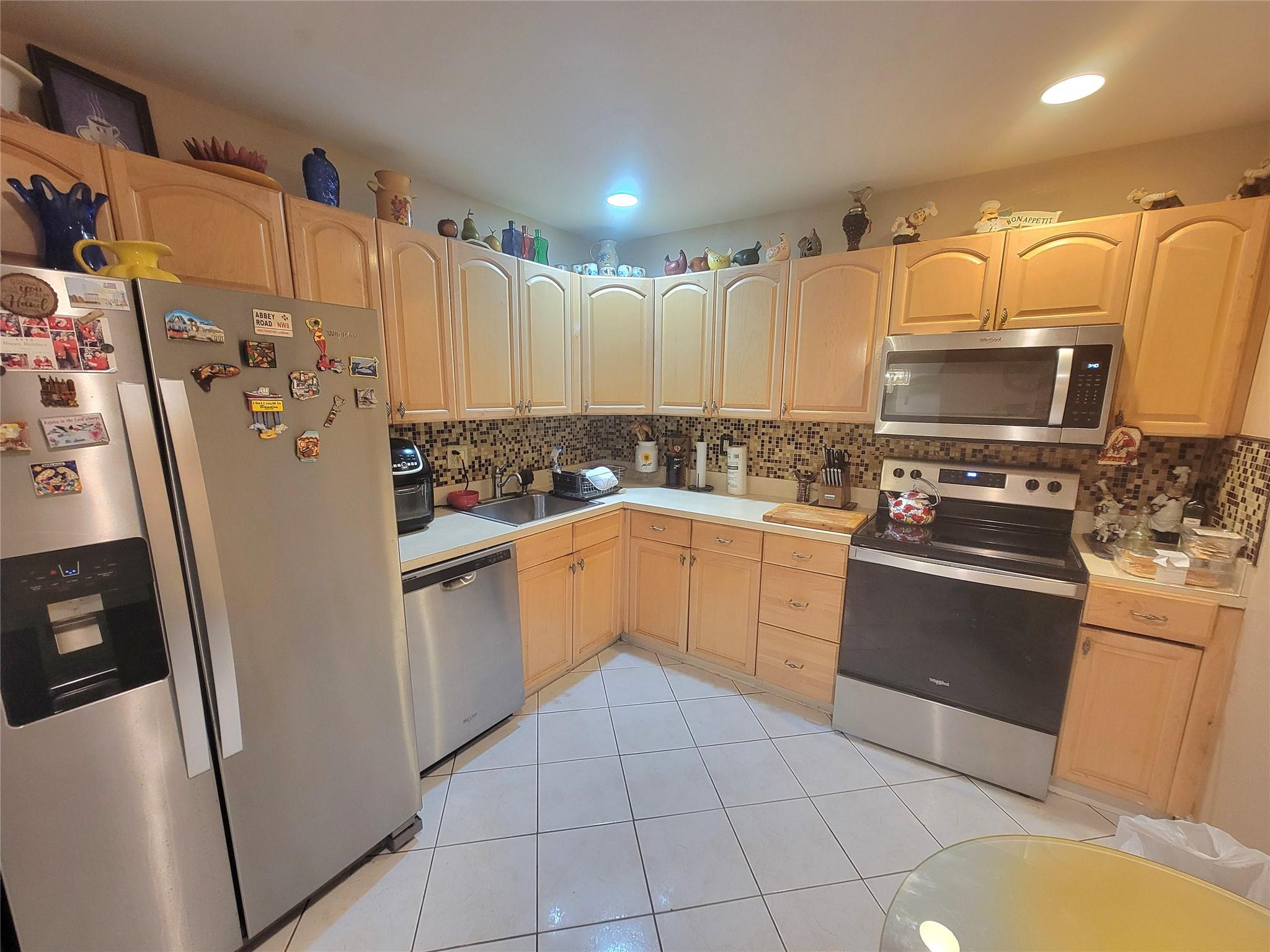 Charming ground floor 2/2 unit in a senior 55+ community. Updated kitchen and bathrooms. Screened porch. Storm shutters. Master bedroom with walk-in closet. Option of an extended living room or 2nd bedroom. New Water Heater. Bright and spacious. Beautifully maintained Condo with private porch that opens directly onto lush greenery. Furniture is negotiable. Extra storage. Lobby secured building. Clubhouse with gym, library and game room. Heated pool and tennis court. Maintenance includes water, fiber optic cable and high-speed internet. Centrally located. No rentals are allowed