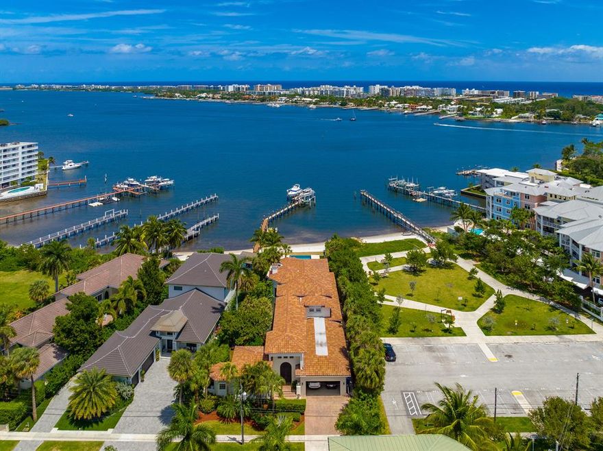 Welcome to paradise! Gorgeous views of the Intracoastal Waterway and short distance from Boynton Beach inlet. This home features four bedrooms in the main house and a guest cottage with private entrance and kitchen.  New heated infinity edge pool, updated kitchen and bathrooms in 2019, new roof also in 2019. Soaring ceilings, 24,000 lb boat lift, 40-kw generator, 30 foot ceilings, LED lighting, marble flooring, quartz countertops and viking appliances in the kitchen.  Walking distance to Old Key lime house, 3 blocks from the beach AND your own private white sandy beach! Panoramic views from enlarged master suite, huge closets, soak in your tub looking over the Intracoastal. Call me today to show!  Home has been painted white, new photos and videos Coming SOON!