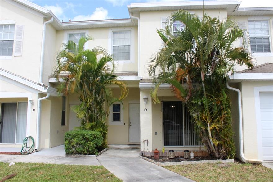 Great townhouse with wonderful back patio overlooking a great green space. Quiet neighborhood situated close to 2 city parks.  Great starter home! Come make it your own!