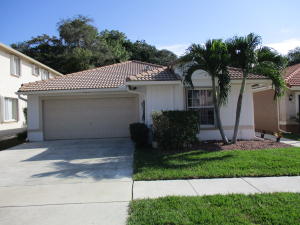Great, affordable and highly desirable Boca Spring's neighborhood. Well maintained one story home, 3 bedrooms, 2 baths. Tremendous, private backyard that borders a sanctuary. Roof approx. 5-8 years old. Updated granite kitchen and baths. New water heater. Blinds and window treatments less than a year old. Accordion Shutters. Walking distance to the community pool, tennis, basketball courts, and playground.