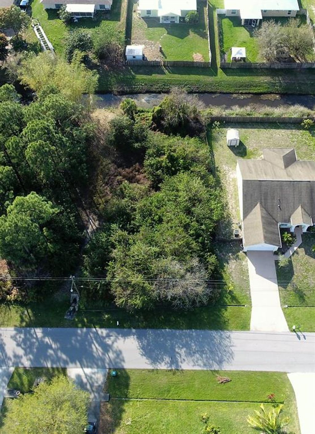 Photo of 3358 SW Martin Street, Port Saint Lucie, FL 34953 (MLS # R10695932)