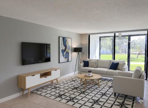 Photo of 218 Lake Pointe Drive #108, Oakland Park, FL 33309 (MLS # R11140906)