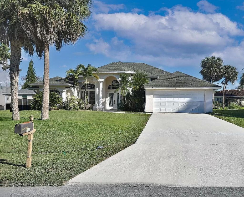 Photo of 2668 SW Ace Road, Port Saint Lucie, FL 34953 (MLS # R10979149)