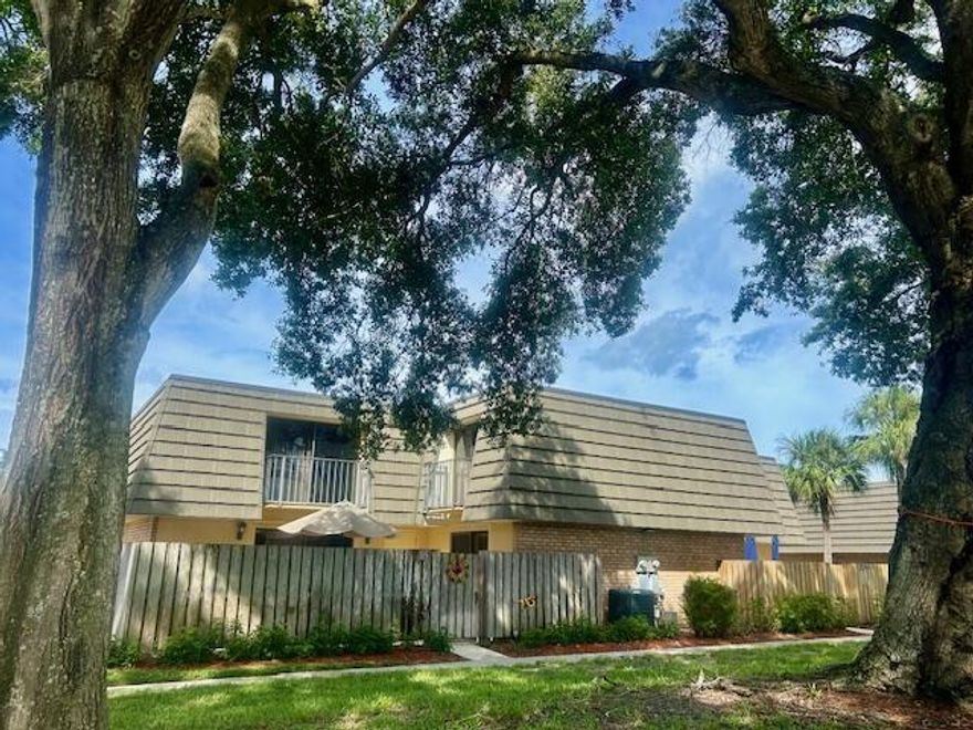 Fabulous 2 Bedroom, 2.5 Bath townhome located in the heart of West Palm Beach! Nestled in the well maintained community of Sandalwood Lakes, this lovely townhome offers 1,235 SF of living space with laminate floors and carpet. Spacious primary suite boasts huge walk-in closet. Downstairs powder room has full size washer and dryer. Huge fenced courtyard patio is perfect for entertaining! This pet friendly community has community pool, tennis, playground, dog park and more! Water and cable included in your HOA!!