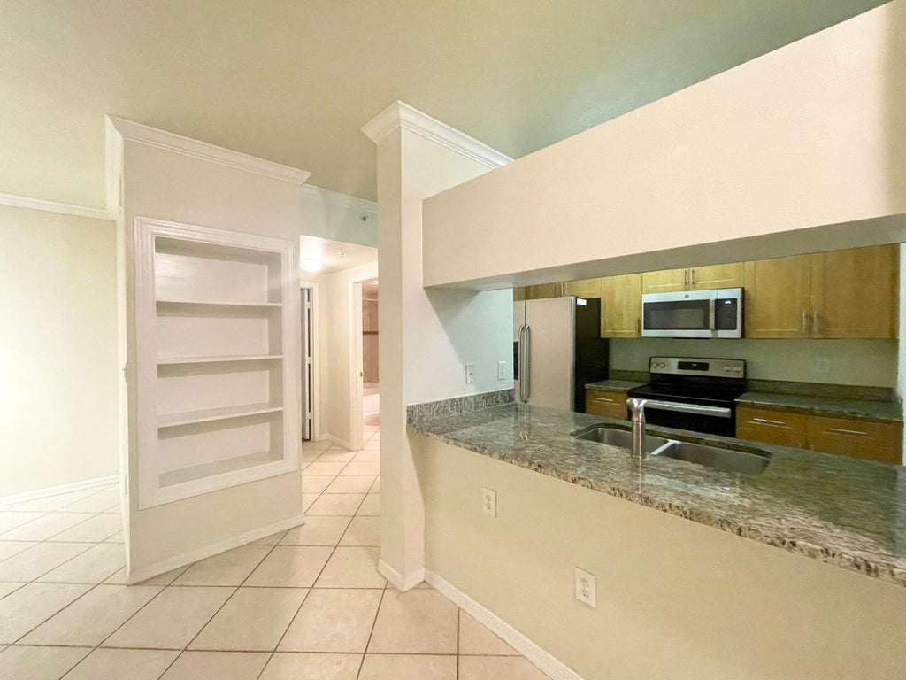Photo of 6533 Emerald Dunes Drive #107, West Palm Beach, FL 33411 (MLS # R11014709)