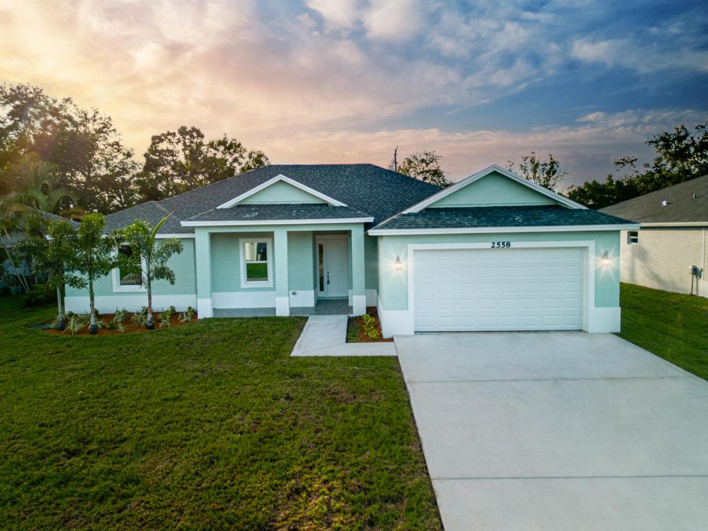 Photo of 3983 SW Savona Boulevard, Port Saint Lucie, FL 34953 (MLS # R10953279)