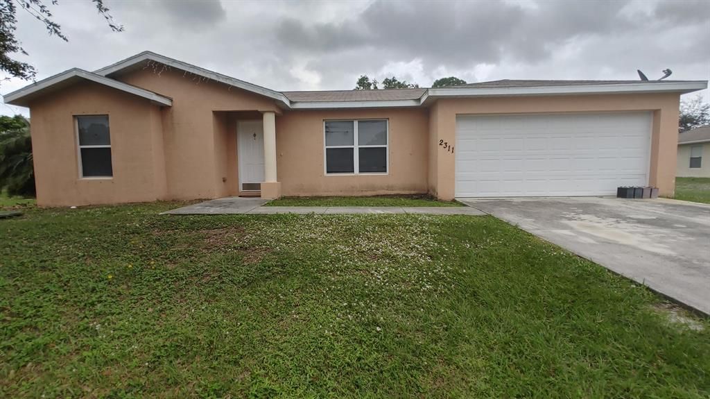 Photo of 2311 SE Charleston Drive, Port Saint Lucie, FL 34952 (MLS # R10768244)