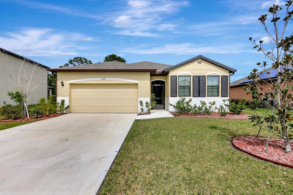 Photo of 6037 NW Regent Street, Port Saint Lucie, FL 34983 (MLS # R10963988)