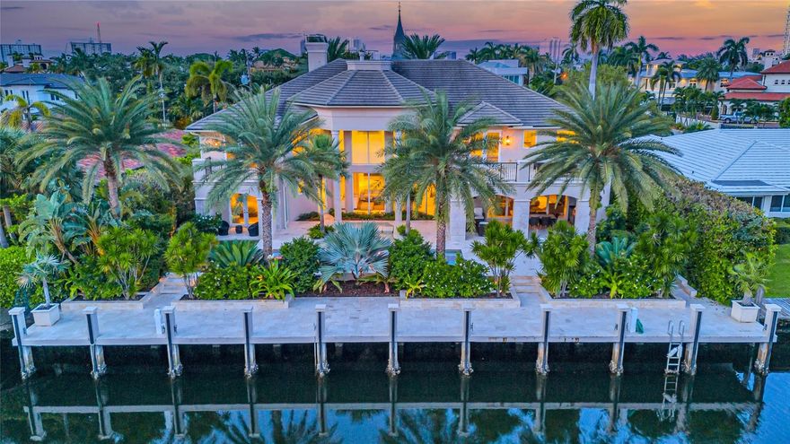 Introducing an exquisite luxury estate built in 2013 nestled in the prestigious gated Harbor Beach This architectural masterpiece offers 6 ensuite bedrooms 7.2 lavish bathrooms a grand media room, executive office and a state-of-the-art gym. The gourmet kitchen is a chef’s dream, a Viking 6-burner gas range, dual Miele ovens, dual Viking refrigerators/freezers and a butlers pantry. Spectacular temperature-controlled wine cellar, formal dining room, and sophisticated second living room with a cozy fireplace. The movie/media room with oversized screen, Outdoor living with a climatized summer kitchen, expansive veranda, sundeck, and a stunning swimming pool, complete with a cabana bath and outdoor shower. 100ft concrete dock Crestron smart home technology throughout and full-house generator