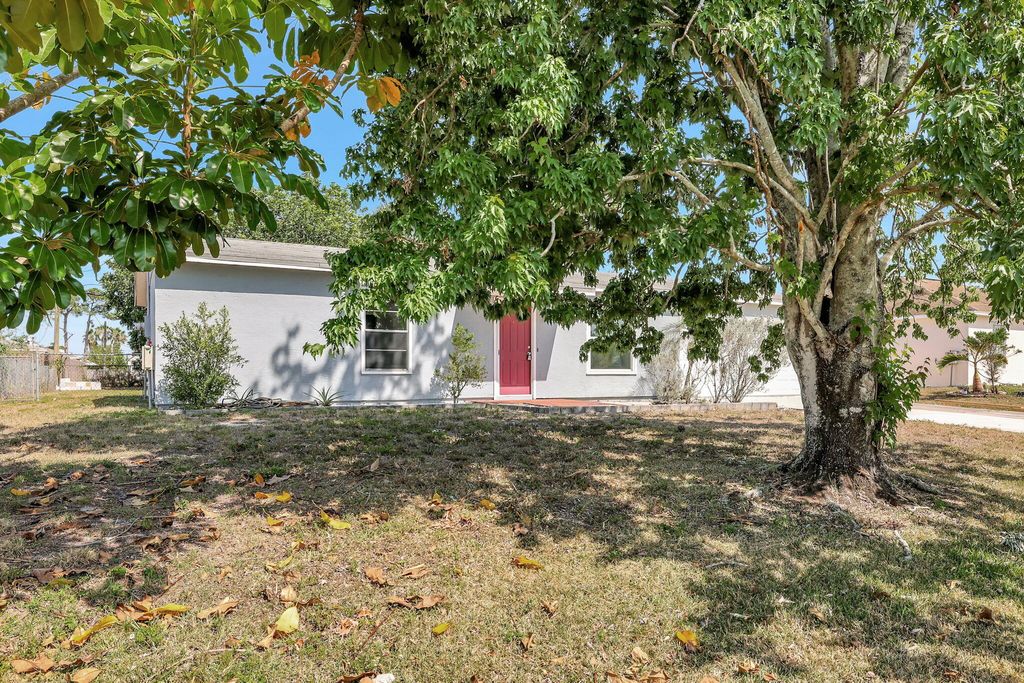 Photo of 3413 SW Ronald Street, Port Saint Lucie, FL 34953 (MLS # R10979704)