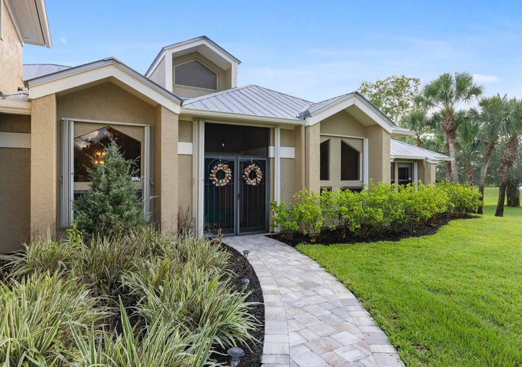 Photo of 1206 SW Catalina Street, Palm City, FL 34990 (MLS # R11002530)