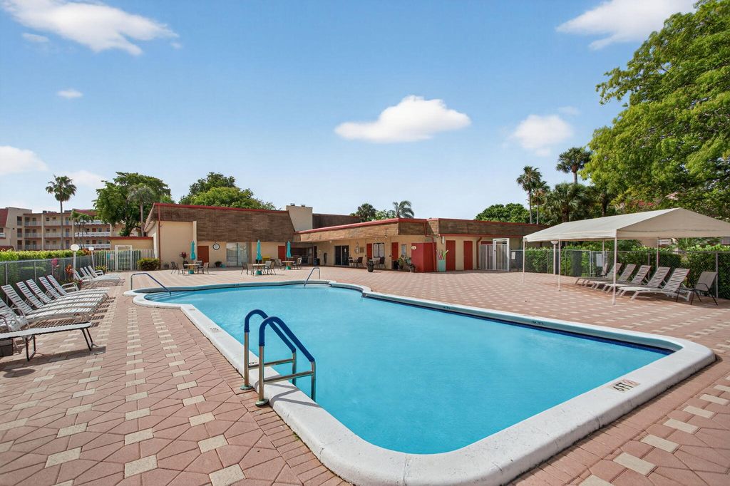 Photo of 1030 Country Club Drive #407, Margate, FL 33063 (MLS # B26011047)