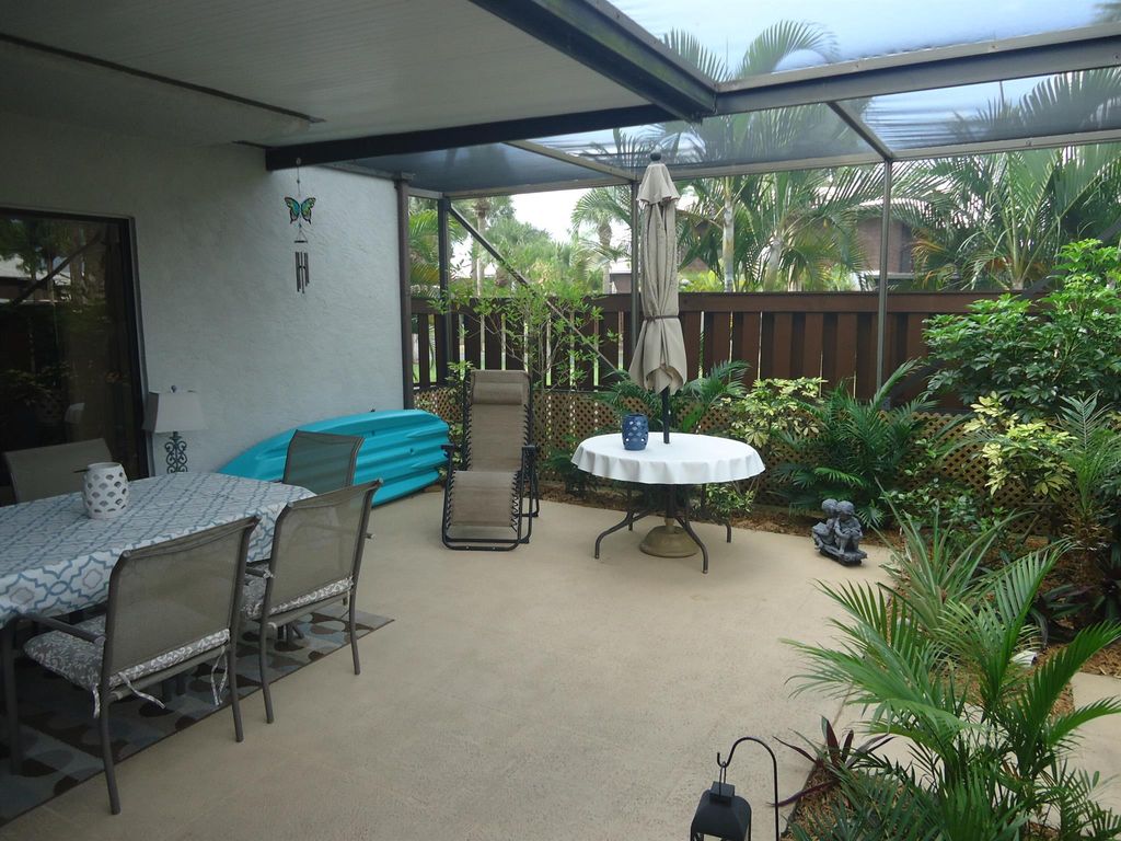 Photo of 1603 SE Excaliber Lane #C, Port Saint Lucie, FL 34952 (MLS # R10975603)