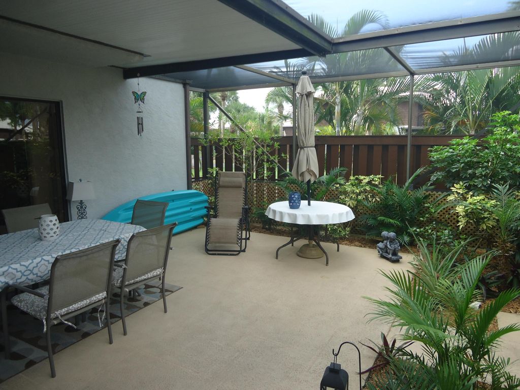 Photo of 1603 SE Excaliber Lane #C, Port Saint Lucie, FL 34952 (MLS # R10975603)