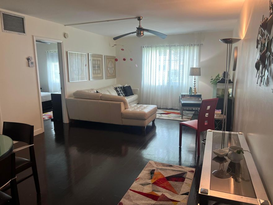 Sought-after MANOR GROVE! Affordably priced 1BR/1BA ground-floor unit just a short walk to Wilton Drive restaurants, shops, and nightlife. Updated kitchen and bathroom featuring granite countertops, breakfast bar, and stainless steel appliances. Real wood floors throughout and spacious bedroom with walk-in closet. Enjoy views of the green space through brand-new impact windows. Additional upstairs storage included. Community amenities include a pool, saunas, billiards room, and clubhouse situated on the Middle River. The association has completed numerous indoor and outdoor updates and major improvements. Fully furnished option available if desired.